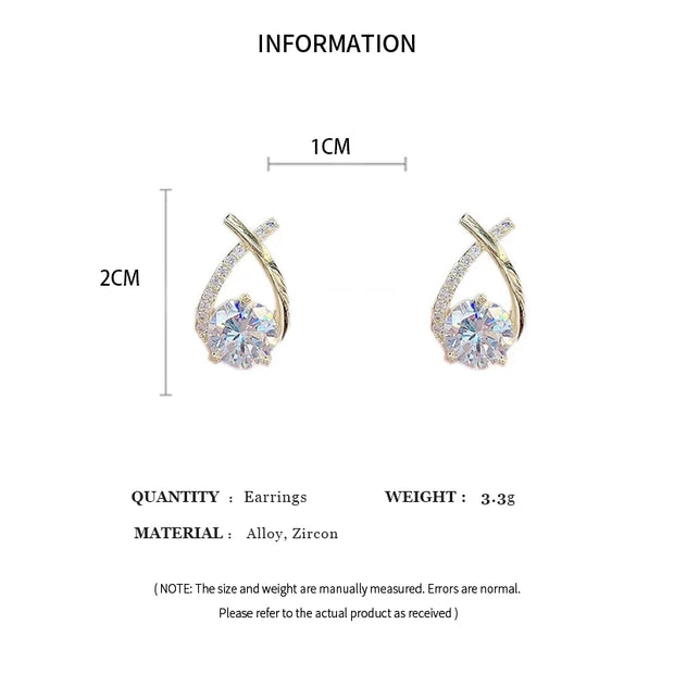 Boucles d’Oreilles Croix Géométriques avec Micro-Strass – Élégance &amp; Raffinement